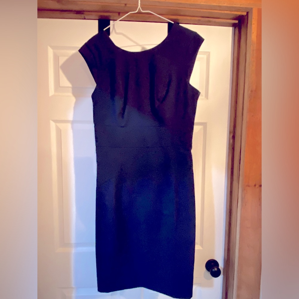 The limited navy blue dress